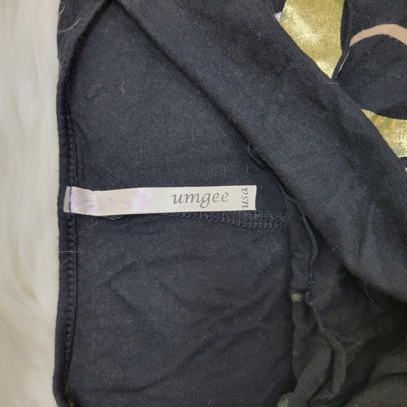 Umgee cold shoulder rushed side soft strechy gold rings top - Picture 4 of 5